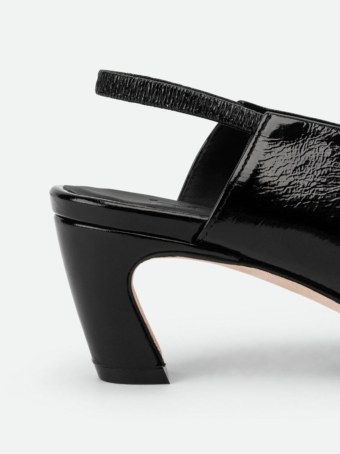 Elisa Black Crinkled Patent Leather Slingbacks - Heel Close-up View - POEVE Collection