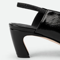 Elisa Black Crinkled Patent Leather Slingbacks - Heel Close-up View - POEVE Collection
