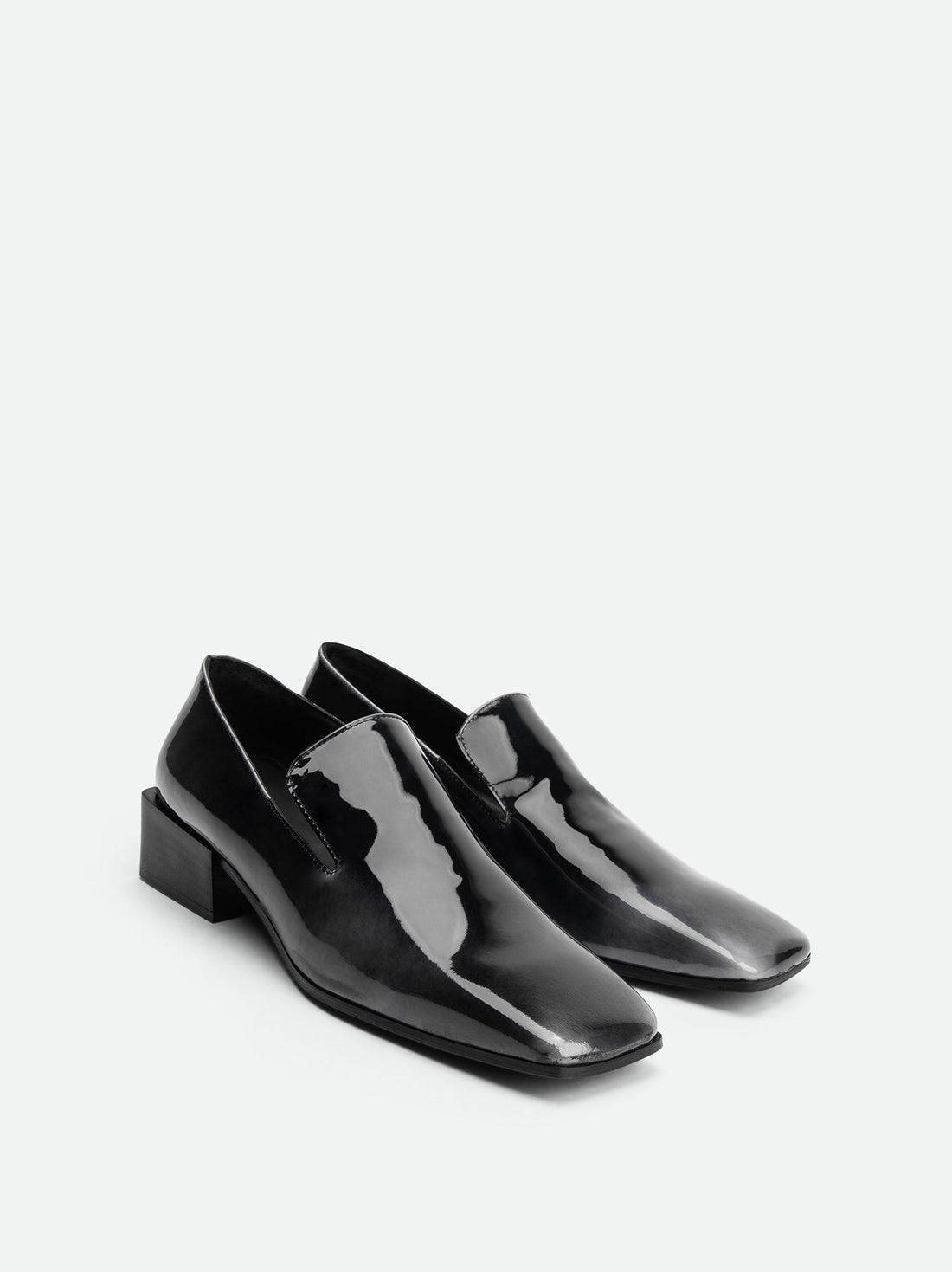 Gwen Pull-Up Black-and-White Leather Loafers – Angled View – POEVE Collection
