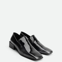 Gwen Pull-Up Black-and-White Leather Loafers – Angled View – POEVE Collection