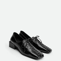 Andee Black Crinkled Glossy Leather Lace-Up Shoes – Angled View – POEVE Collection