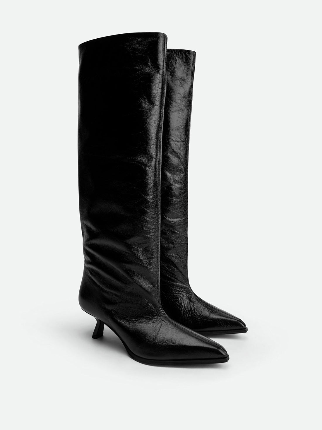 Auree Black Crinkled Glossy Leather Knee-High Boots – Angled View – POEVE Collection