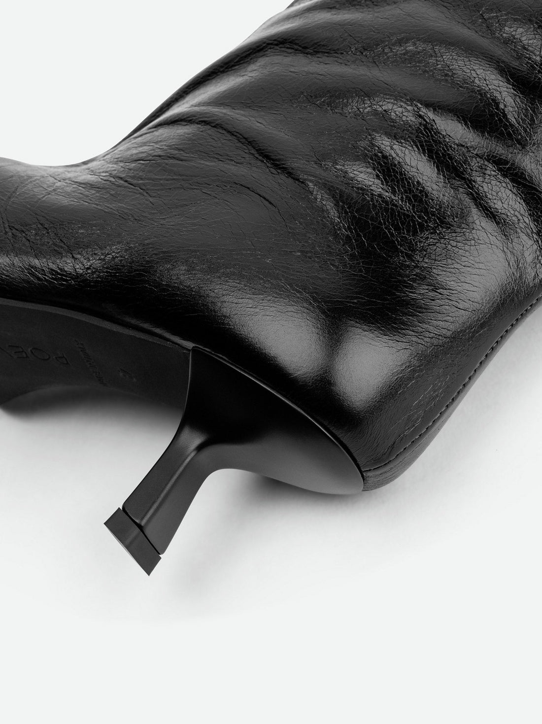 Auree Black Crinkled Glossy Leather Knee-High Boots – Heel Detail View – POEVE Collection