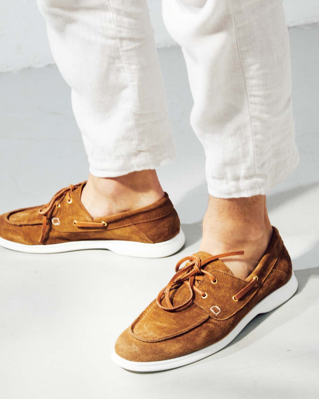 Albert Brown Crust Leather Lace-up Boat Shoes, styled with cropped white trousers - POEVE Collection